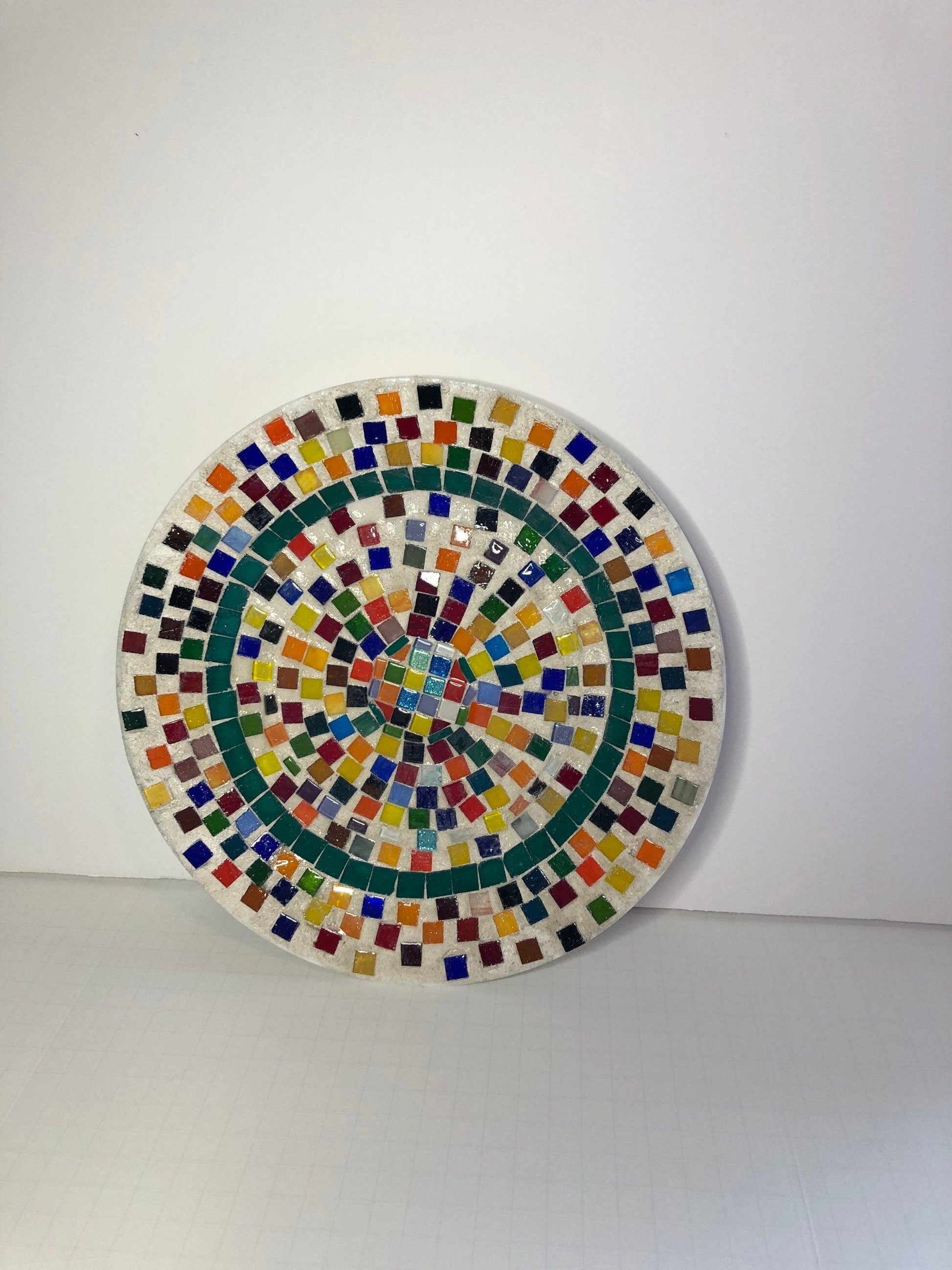 Colorful handcrafted rainbow tile decorative plate with vibrant geometric patterns, ideal for wall decor or display.