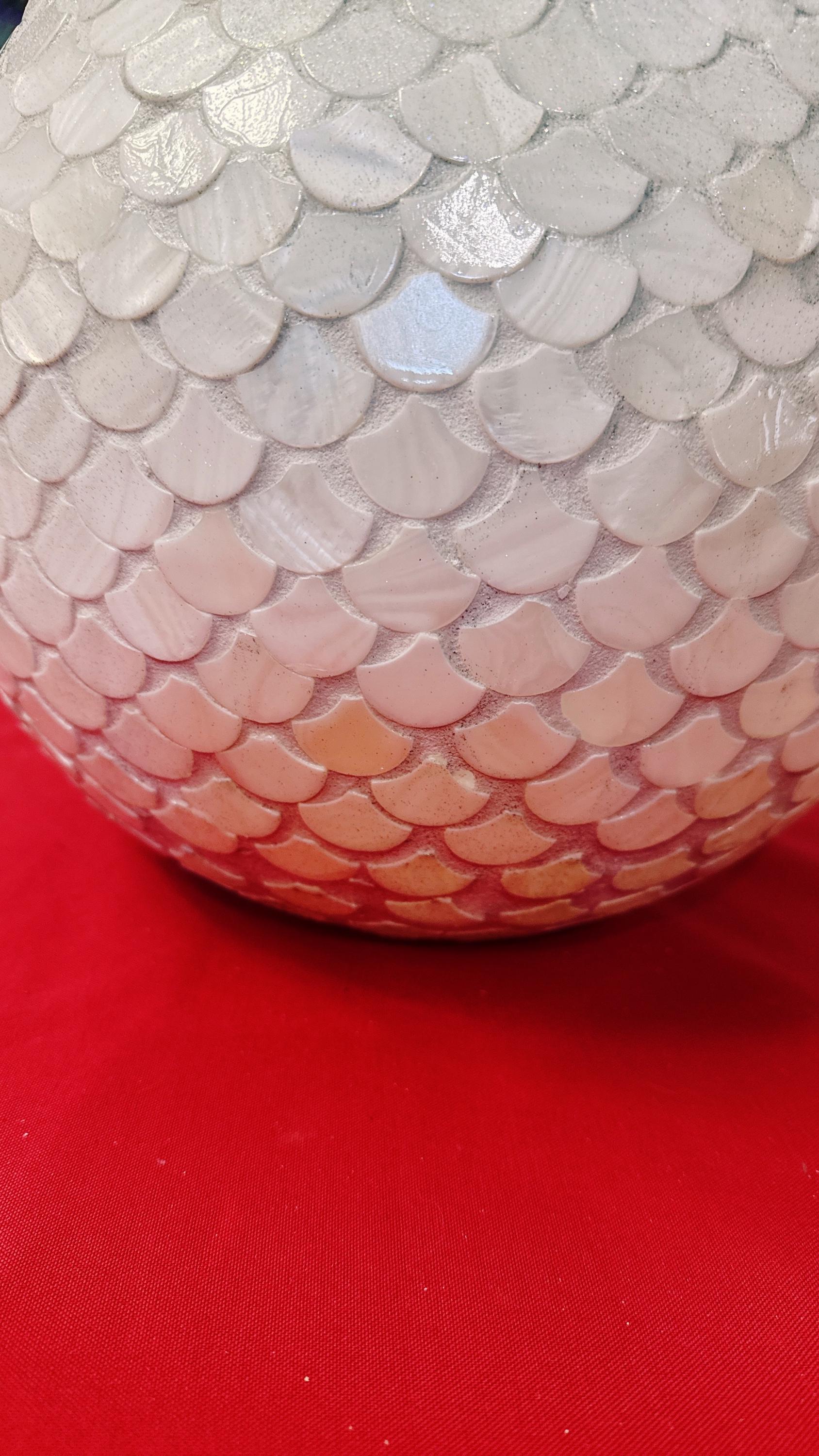 Iridescent white scalloped mosaic bowl with handcrafted design, showcasing vibrant, shimmering glass tiles on a decorative ceramic base.