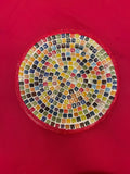 Vibrant handcrafted rainbow mosaic decorative plate with colorful glass tiles, showcasing intricate design and artistic craftsmanship.