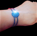 Deep blue glass cuff bracelet with smooth finish, stylish accessory showcasing a bold, vibrant color and modern design.