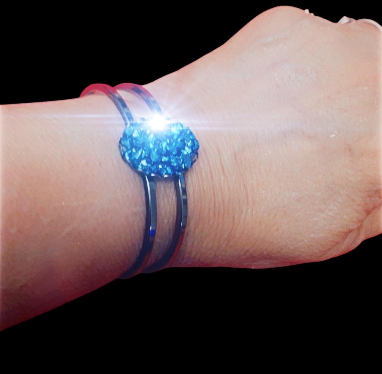 Deep blue glass cuff bracelet with smooth finish, stylish accessory showcasing a bold, vibrant color and modern design.