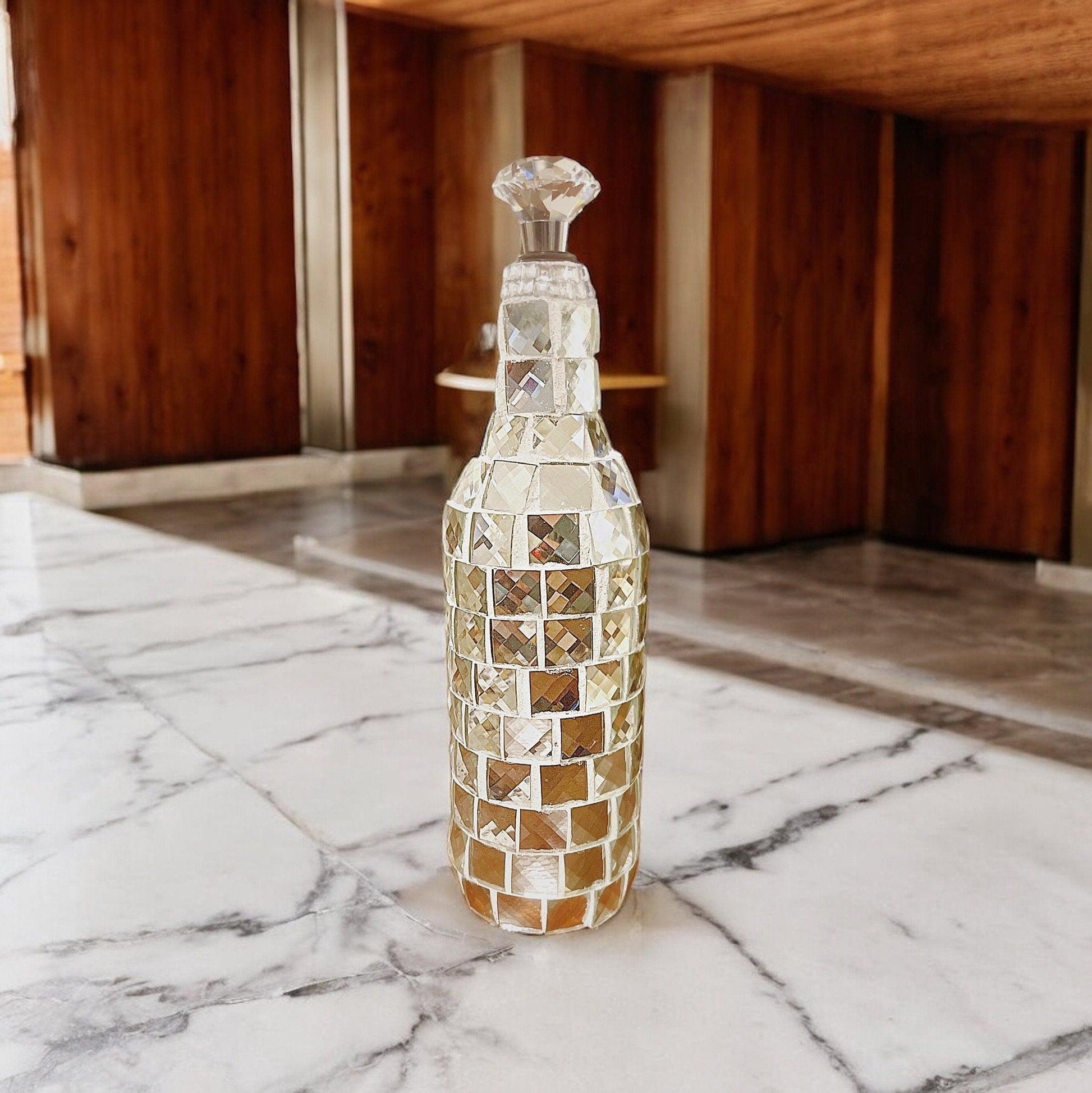 Silver mirrored mosaic wine decanter with intricate mosaic pattern, elegant and stylish for wine serving.
