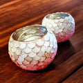 Handcrafted scalloped Capiz shell globe vase with a delicate, translucent design, perfect for elegant home decor.