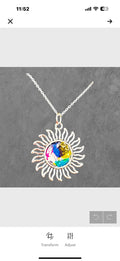 Multicolored glass sunburst pendant necklace with silver chain, featuring vibrant stained glass design, from My Store.