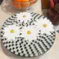 Daisy floral mosaic art cake plate with colorful patterns, handcrafted ceramic design suitable for display or serving desserts.