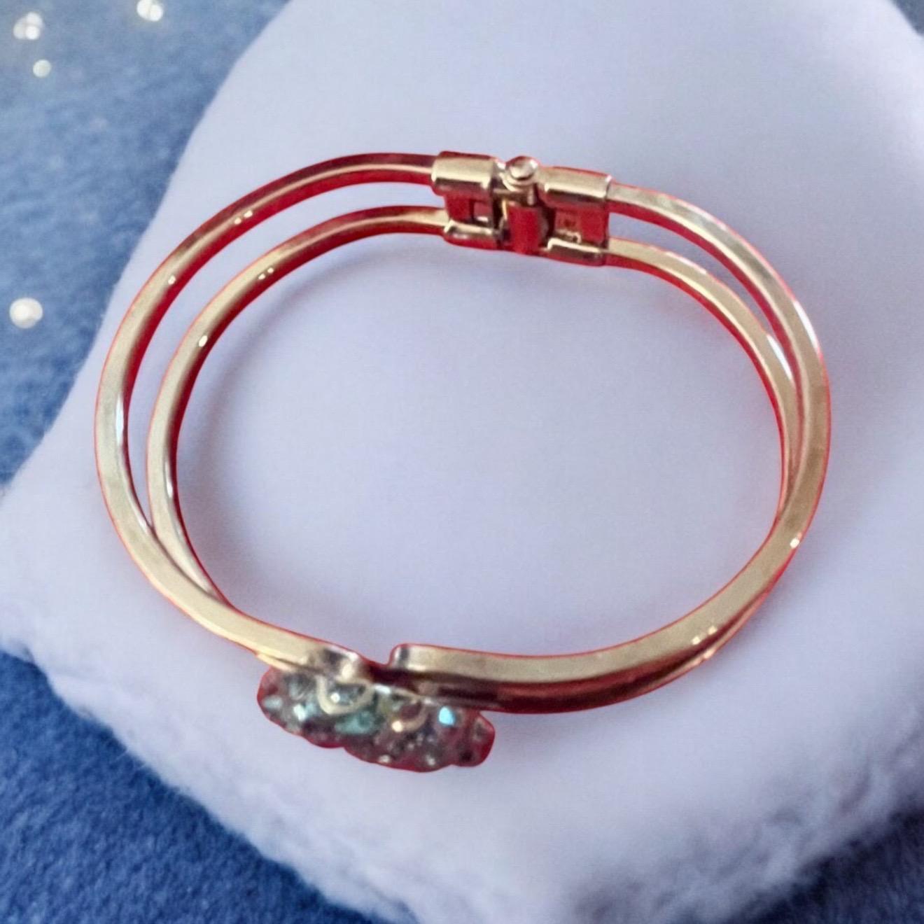 Deep blue glass cuff bracelet with smooth finish, stylish accessory featuring a bold, modern design.