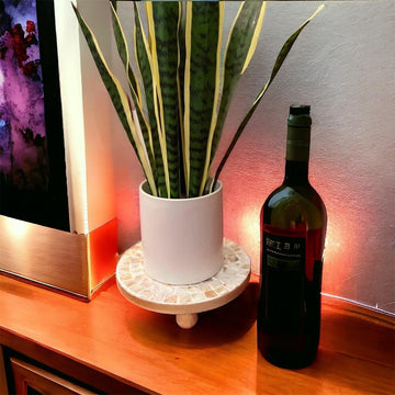 Handmade mother of pearl mosaic plant stand with intricate design, showcasing a decorative and functional home decor piece.