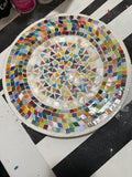 Colorful handcrafted mosaic fruit bowl with vibrant fruit patterns, showcasing intricate tile design and bright decorative details.