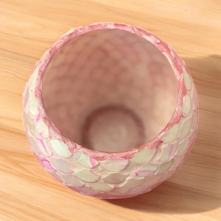 Handcrafted pink and scalloped mosaic bowl with an ombre gradient, showcasing intricate tile patterns and vibrant colors.