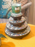 Handcrafted 4-tier mosaic plant stand set with colorful tiled shelves for indoor or outdoor use.