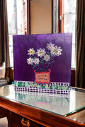 Original paper quilling artwork of a flower pot, showcasing intricate paper coil designs and vibrant colors.