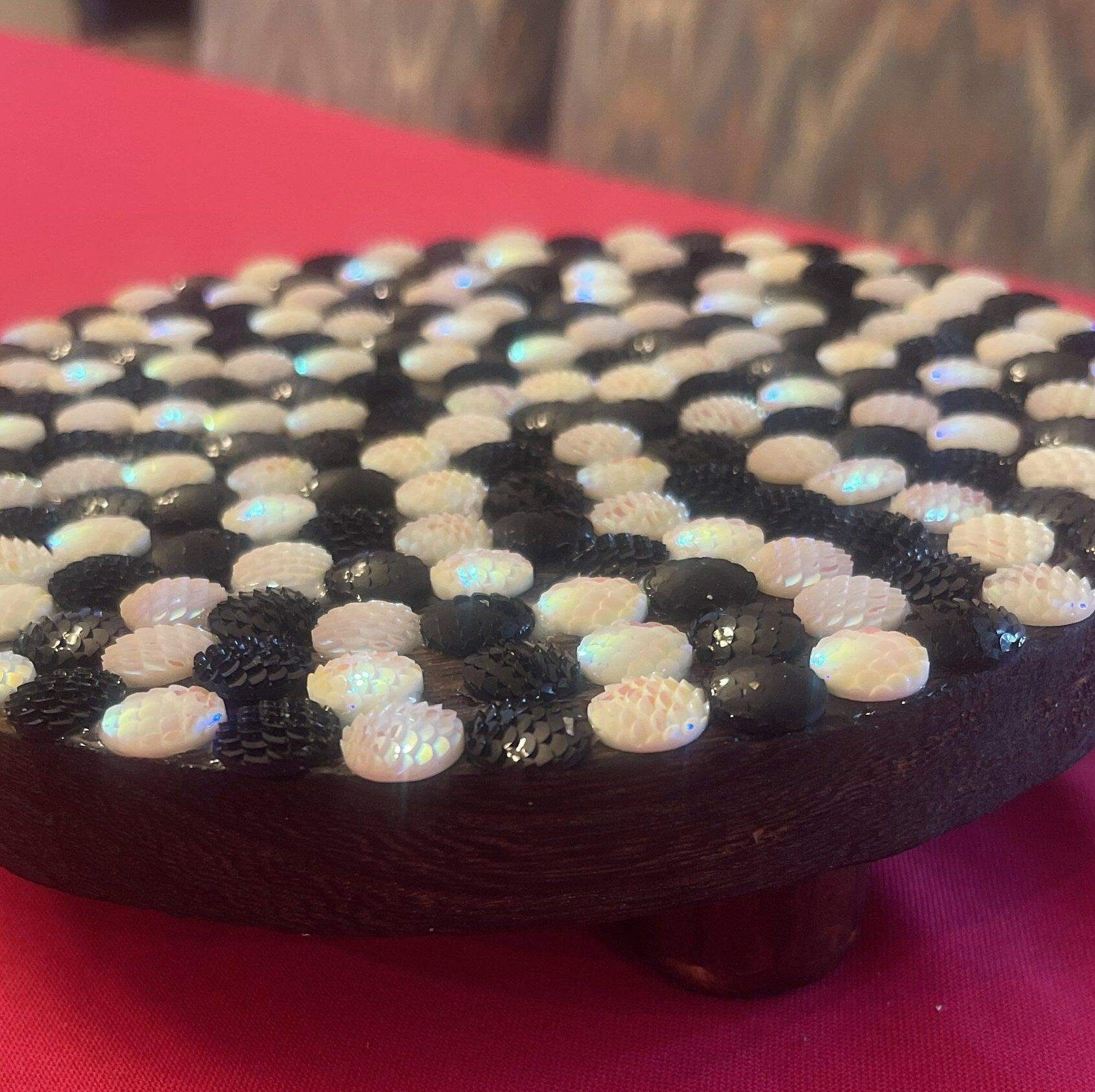 Handmade black and white iridescent mosaic plant stand with intricate tile pattern, designed for indoor or outdoor use