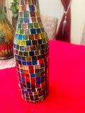 Elegant stained glass look wine decanter with intricate design, perfect for serving and showcasing wine in style.
