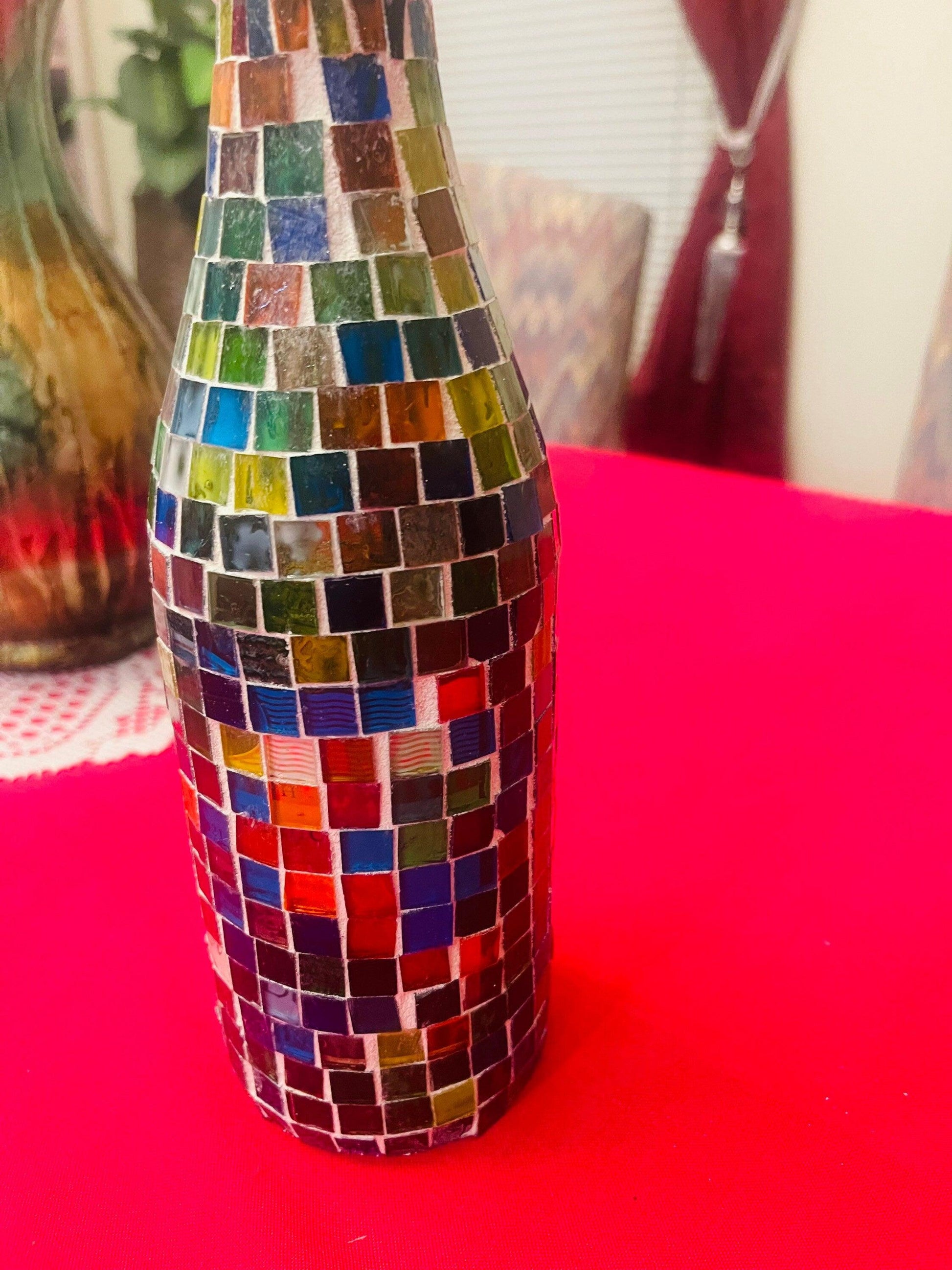 Elegant stained glass look wine decanter with intricate design, perfect for serving and showcasing wine in style.