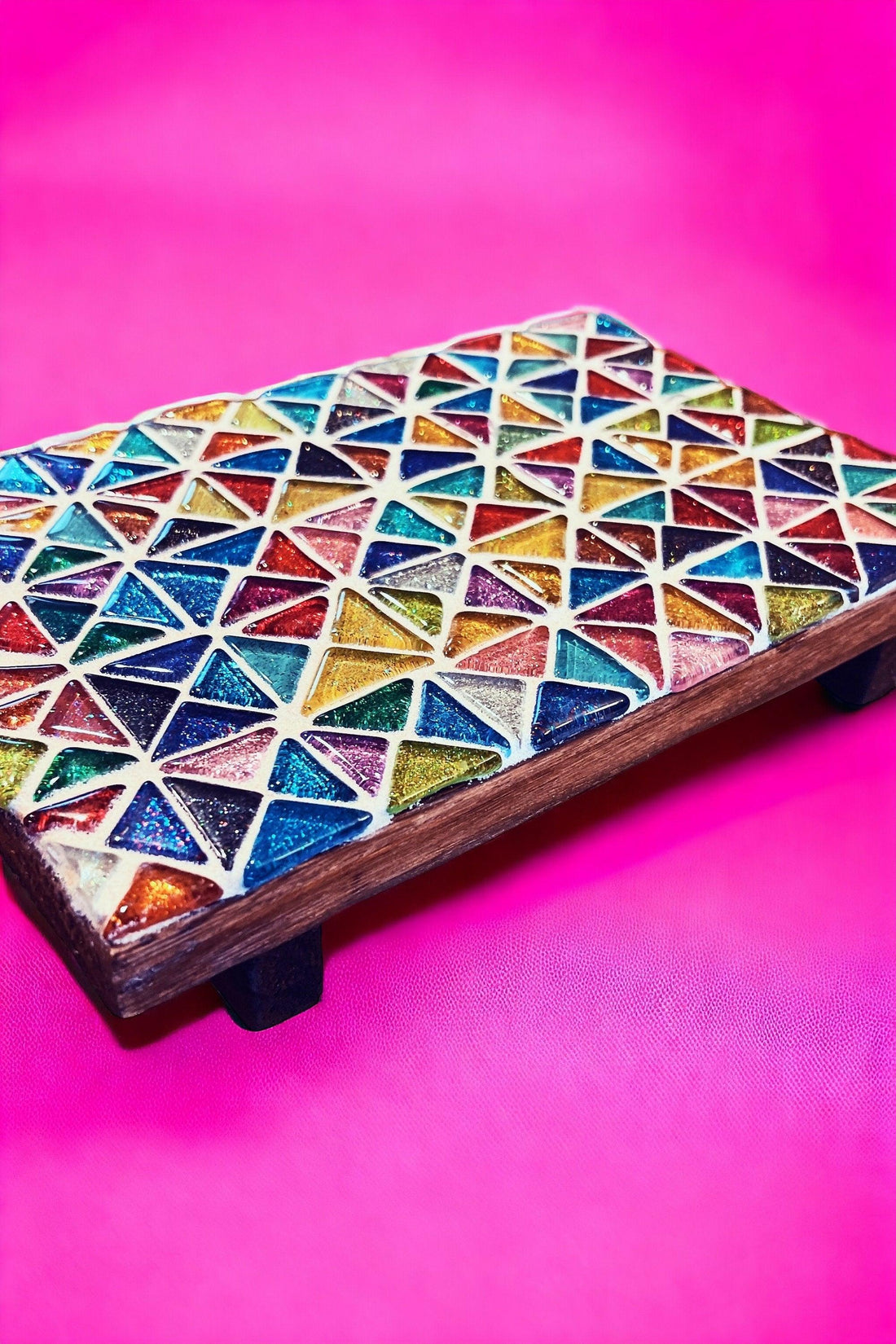 Handmade kaleidoscope mosaic decorative riser with colorful glass tiles, perfect for home decor or display.