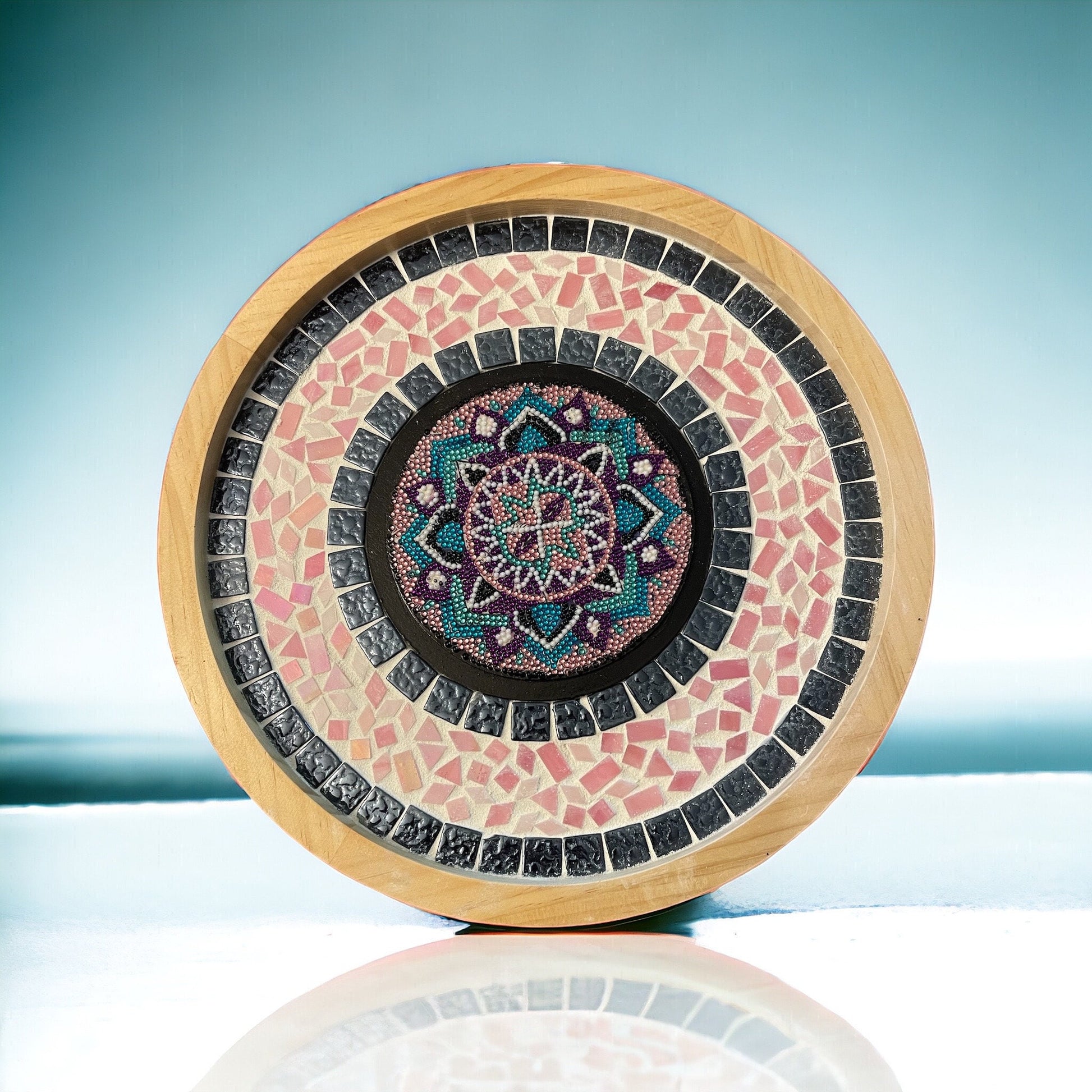 Handcrafted circular mosaic mandala wall art with vibrant colors and intricate patterns, ideal for decorative wall decor.