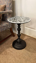 Handmade mosaic round side table with colorful tiled surface and wooden legs, perfect for living room or bedroom decor.