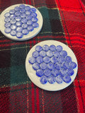 Blue marble mosaic coaster featuring artisanal craftsmanship with intricate tile patterns and a polished finish.