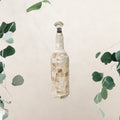Mother of Pearl mosaic wine decanter with elegant design and intricate mosaic pattern, perfect for serving wine in style.