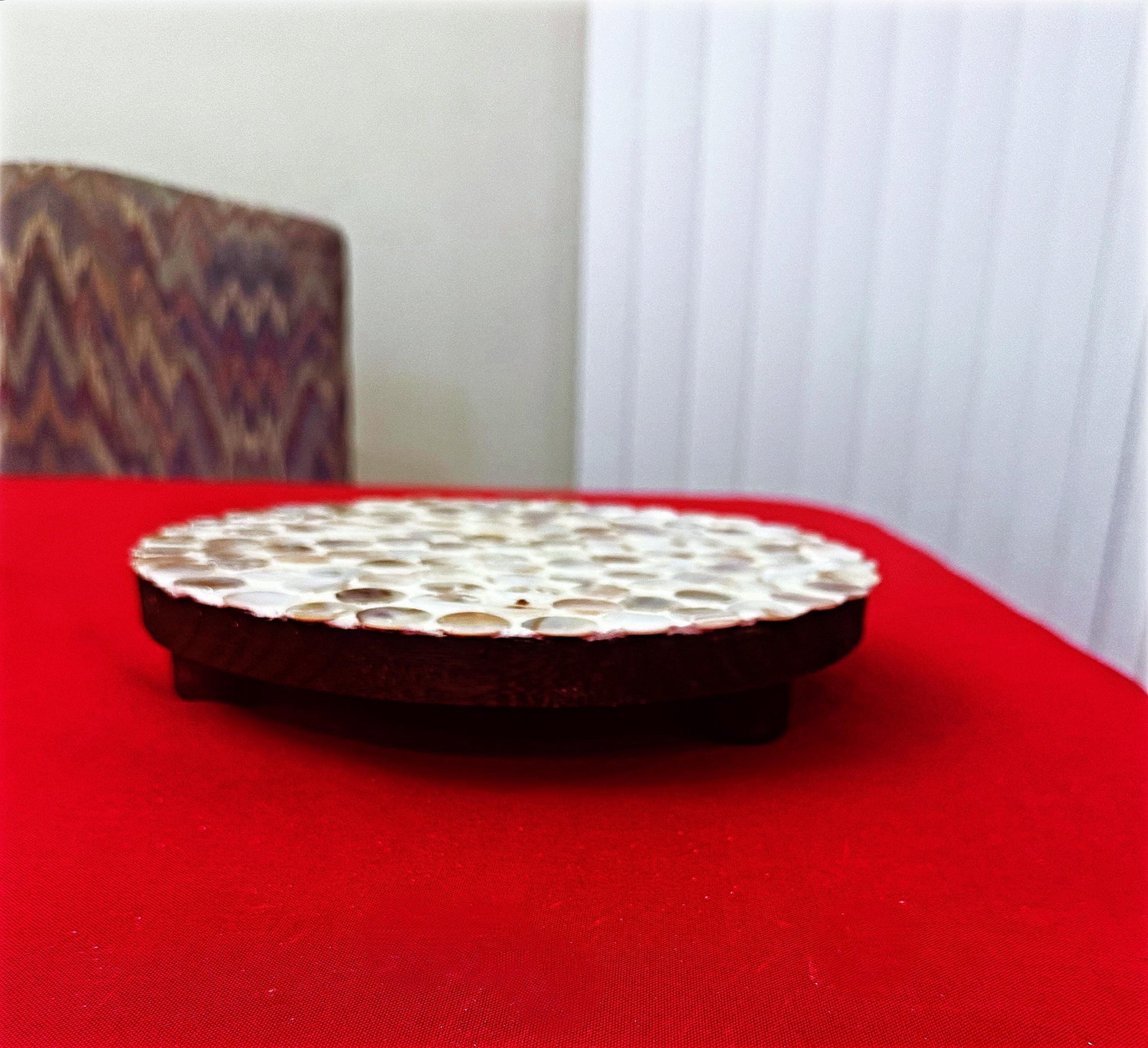 10-inch scalloped mother of pearl plant stand with intricate design, perfect for displaying potted plants and adding elegance to any space.