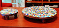 Handcrafted round rainbow mosaic plant stand with colorful glass tiles and sturdy metal frame, ideal for indoor greenery display.