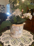 Handcrafted mother of pearl mosaic flower pot with intricate floral design, showcasing the shimmering, decorative ceramic craftsmanship.