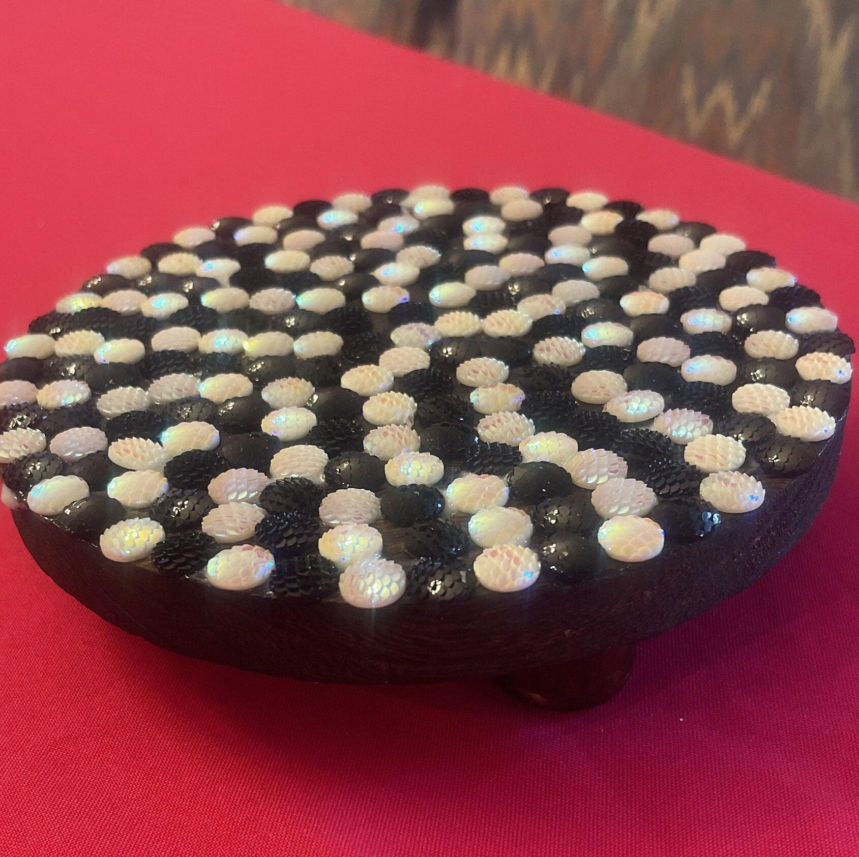 Handmade black and white iridescent mosaic plant stand with intricate tile design, perfect for indoor or outdoor plants.