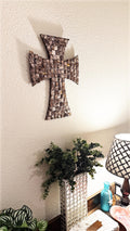 Mother of Pearl mosaic cross with intricate inlay, showcasing shimmering pearl pieces and detailed craftsmanship.