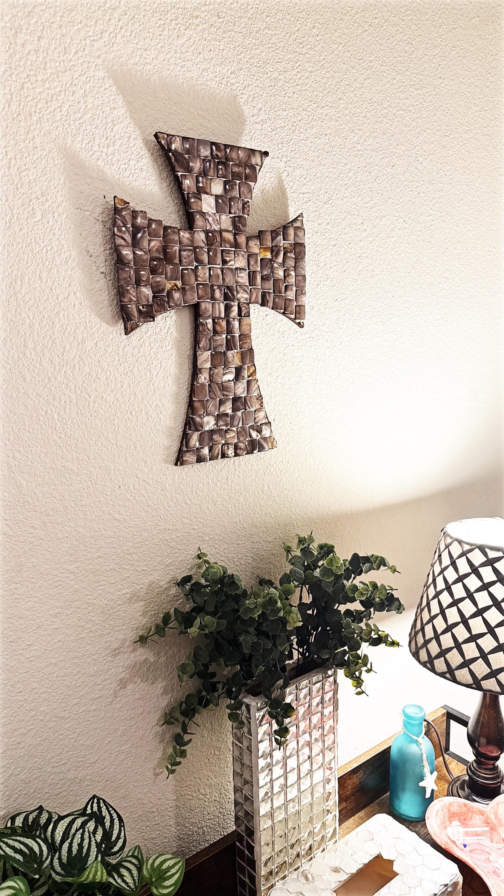 Mother of Pearl mosaic cross with intricate inlay, showcasing shimmering pearl pieces and detailed craftsmanship.