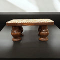 Vintage hand-carved wooden pedestal stand with intricate details, ideal for displaying decorative items or art.