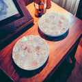 Mother of Pearl mosaic coaster set featuring four elegant coasters with intricate pearl inlay patterns.