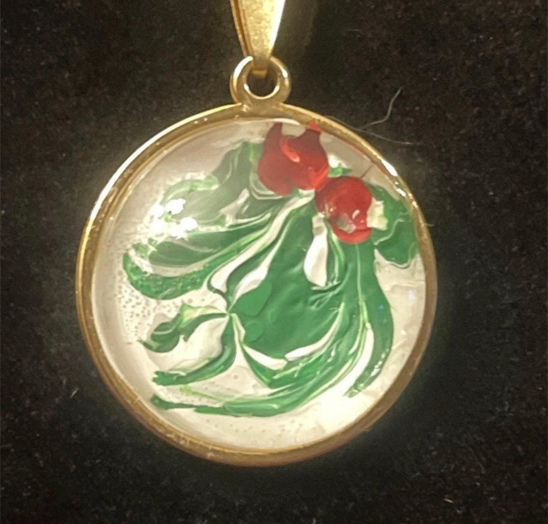 Christmas Holly Pendant Necklace featuring festive holly leaves and berries on a silver chain, perfect for holiday wear.