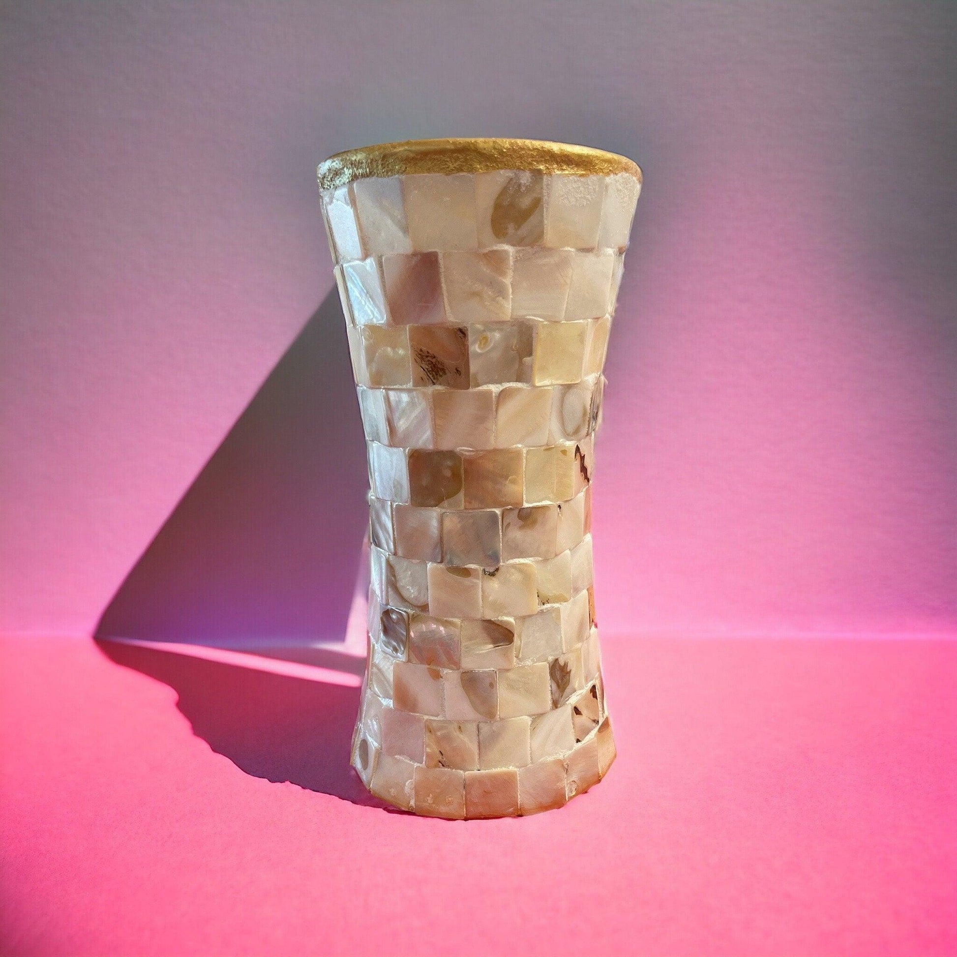 Golden Sand Mother of Pearl hourglass vase with a smooth, polished surface and elegant design.