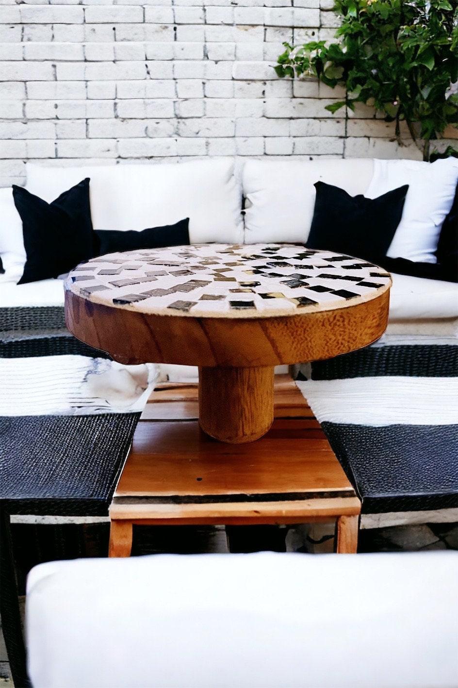 Handmade black and white checkered mosaic plant stand with a round top and decorative base, ideal for indoor or outdoor plants.