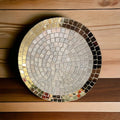 Handmade gold mirror and silver glass mosaic decorative plate with intricate design and reflective surface.