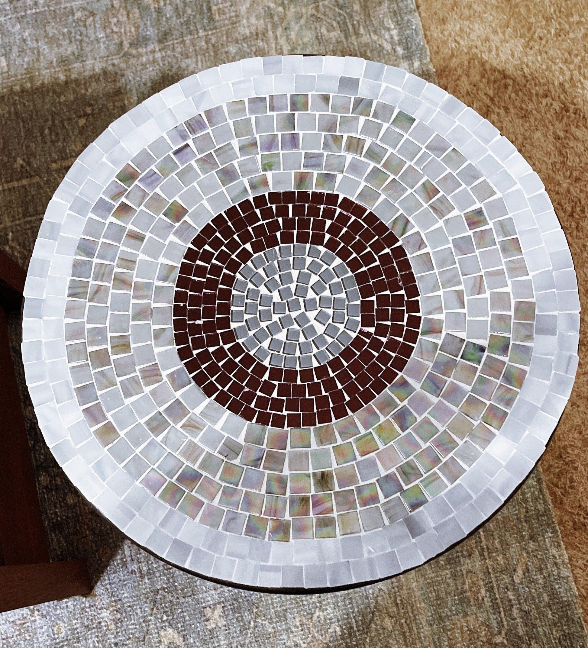 Round side table with iridescent gray and purple mosaic top, 15-inch diameter, 20-inch tall on black metal base.