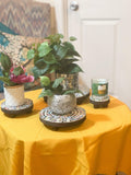 Handcrafted 4-tier mosaic plant stand set with colorful ceramic tiles, perfect for indoor or outdoor plant displays.
