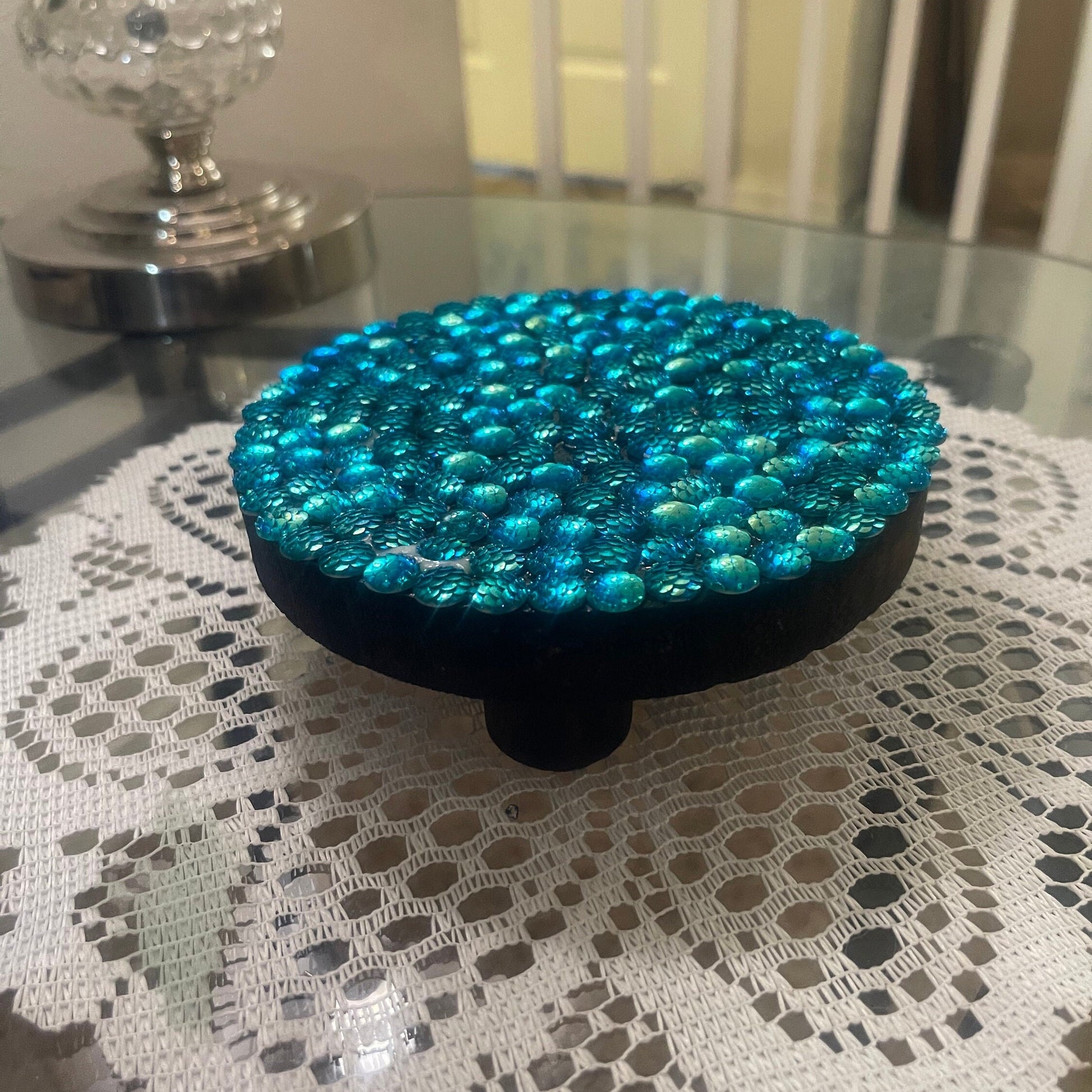 Artisanal turquoise cabochon mosaic plant stand by Miss Bette's Creations with colorful tiled design and sturdy base.
