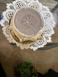 Handcrafted oyster shell relief planter with textured shell design, perfect for coastal-inspired home decor.