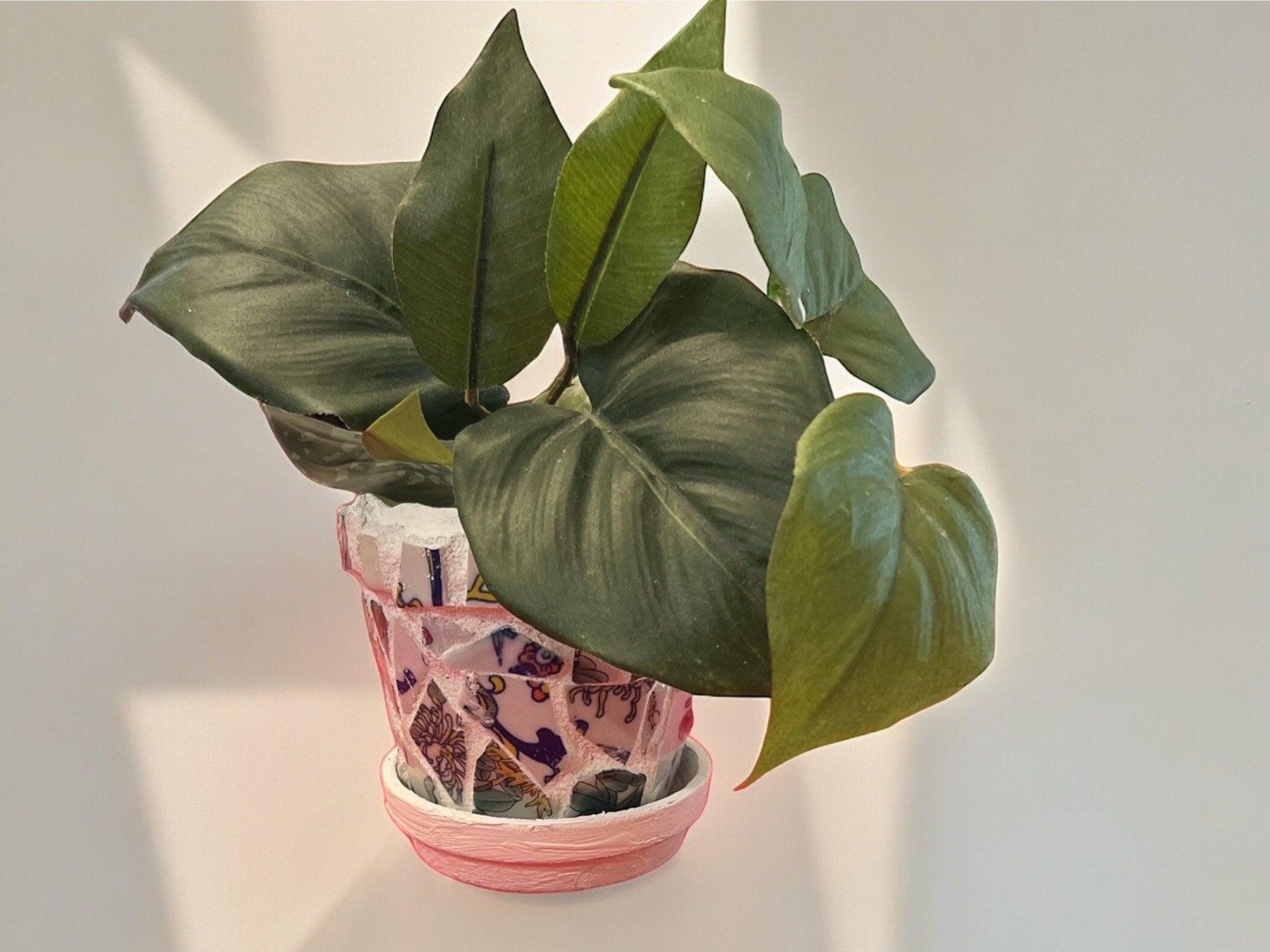 Handcrafted Broken China Mosaic Planter with Saucer, featuring colorful mosaic tiles and a sturdy ceramic base.